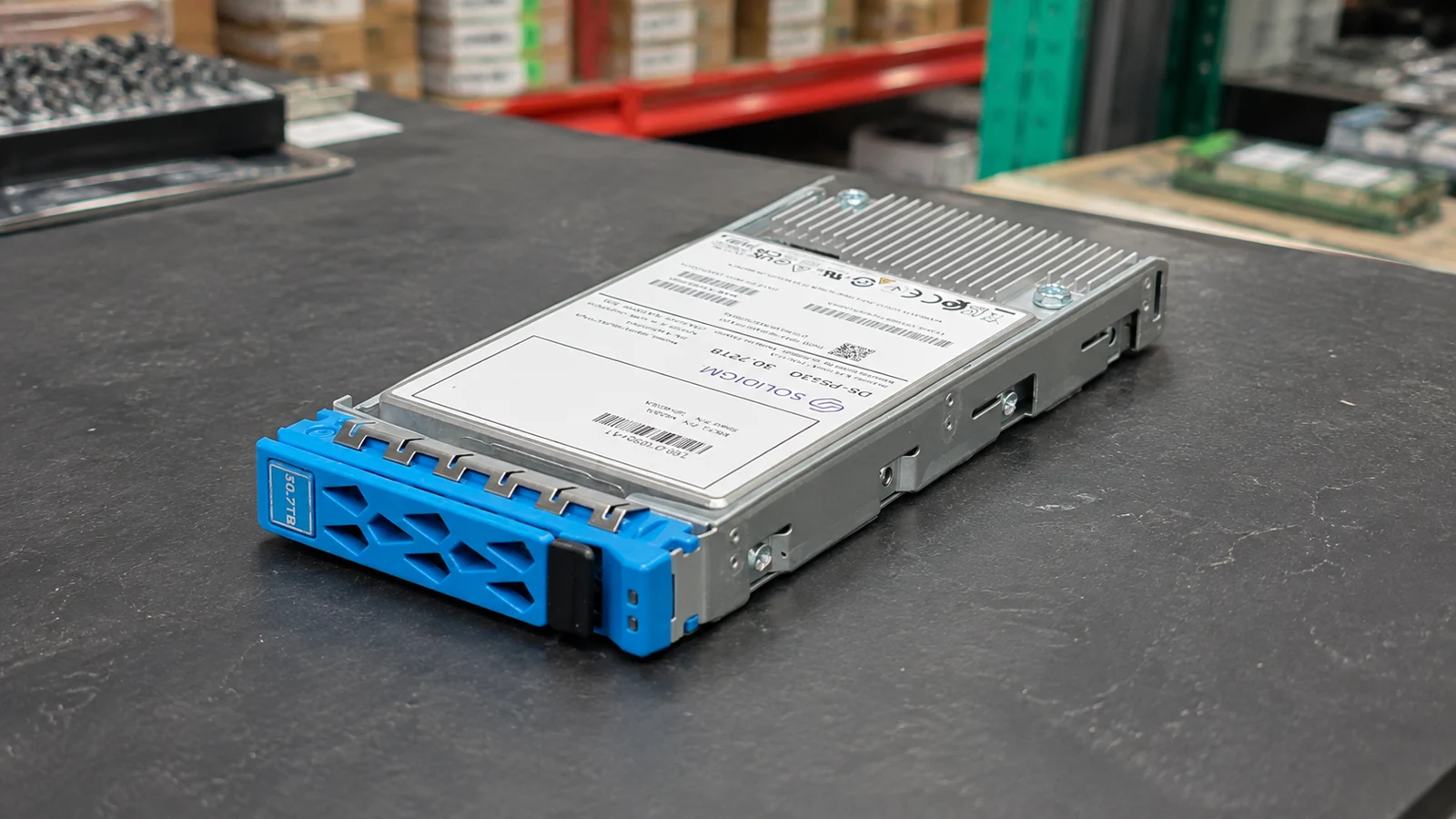 NetApp SP-4030A 30.72TB NVMe U.2 SSD with original carrier and label · illustration